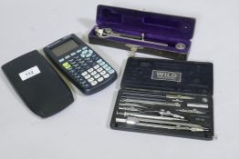 A cased Stanley technical instrument, Heerbrugg Compasses and a Texas Instruments calculator