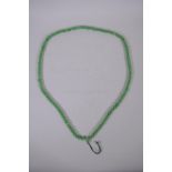 A string of apple green hardstone mala beads, 100 cm long
