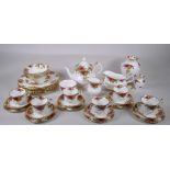 A Royal Albert Old Country Rose six place setting part dinner and tea service, comprising teapot,