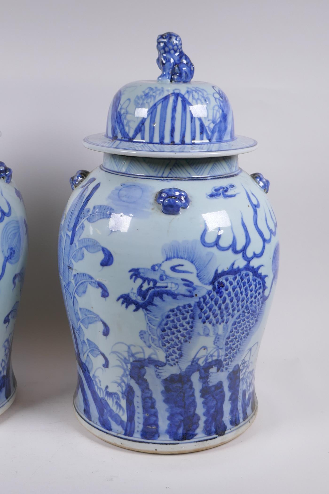 A pair of Chinese blue and white porcelain jars and covers with lion mask, kylin and Fo-dog - Image 2 of 6