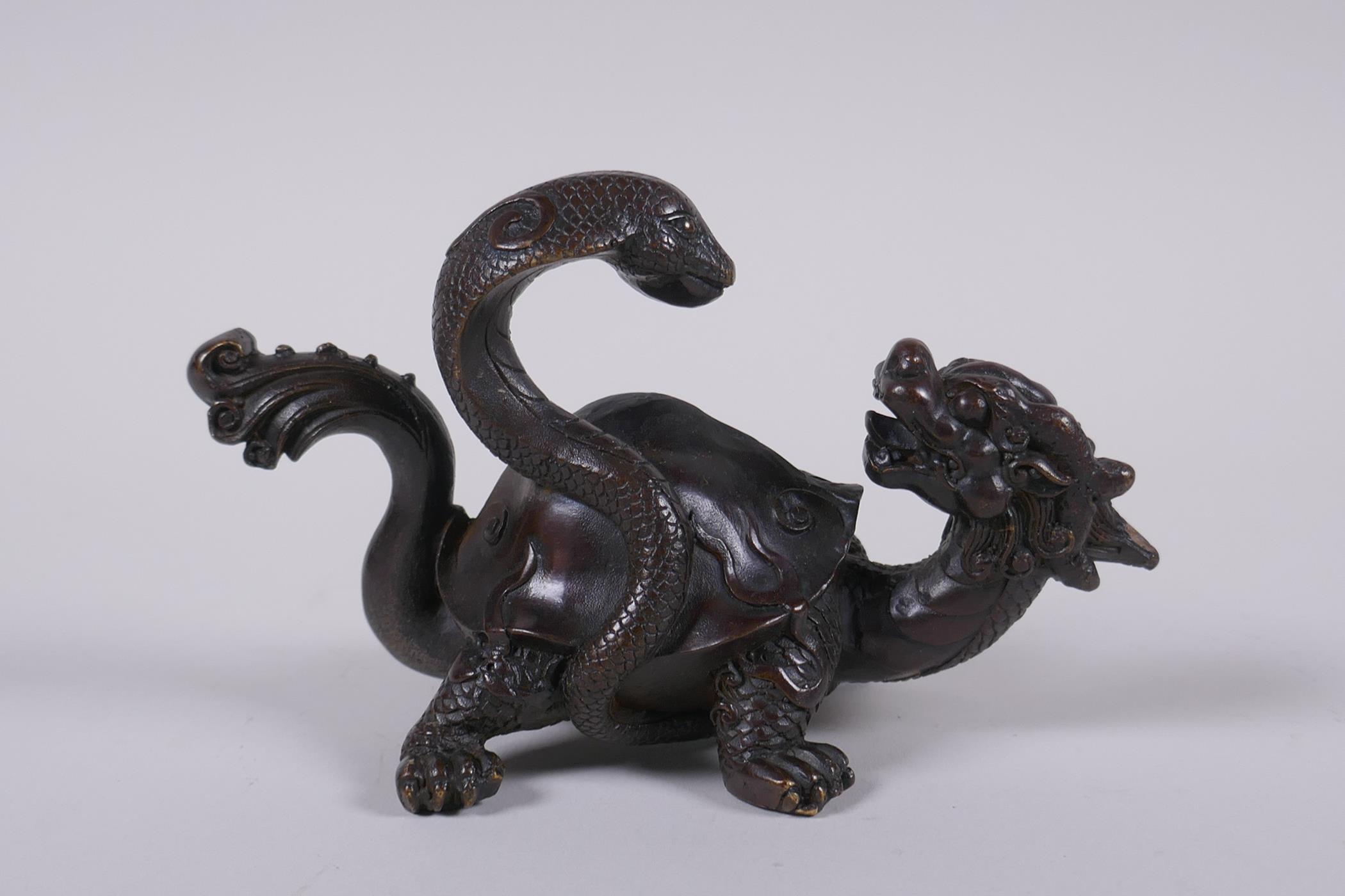 A Chinese bronze figure of a dragon tortoise and snake, 14cm long