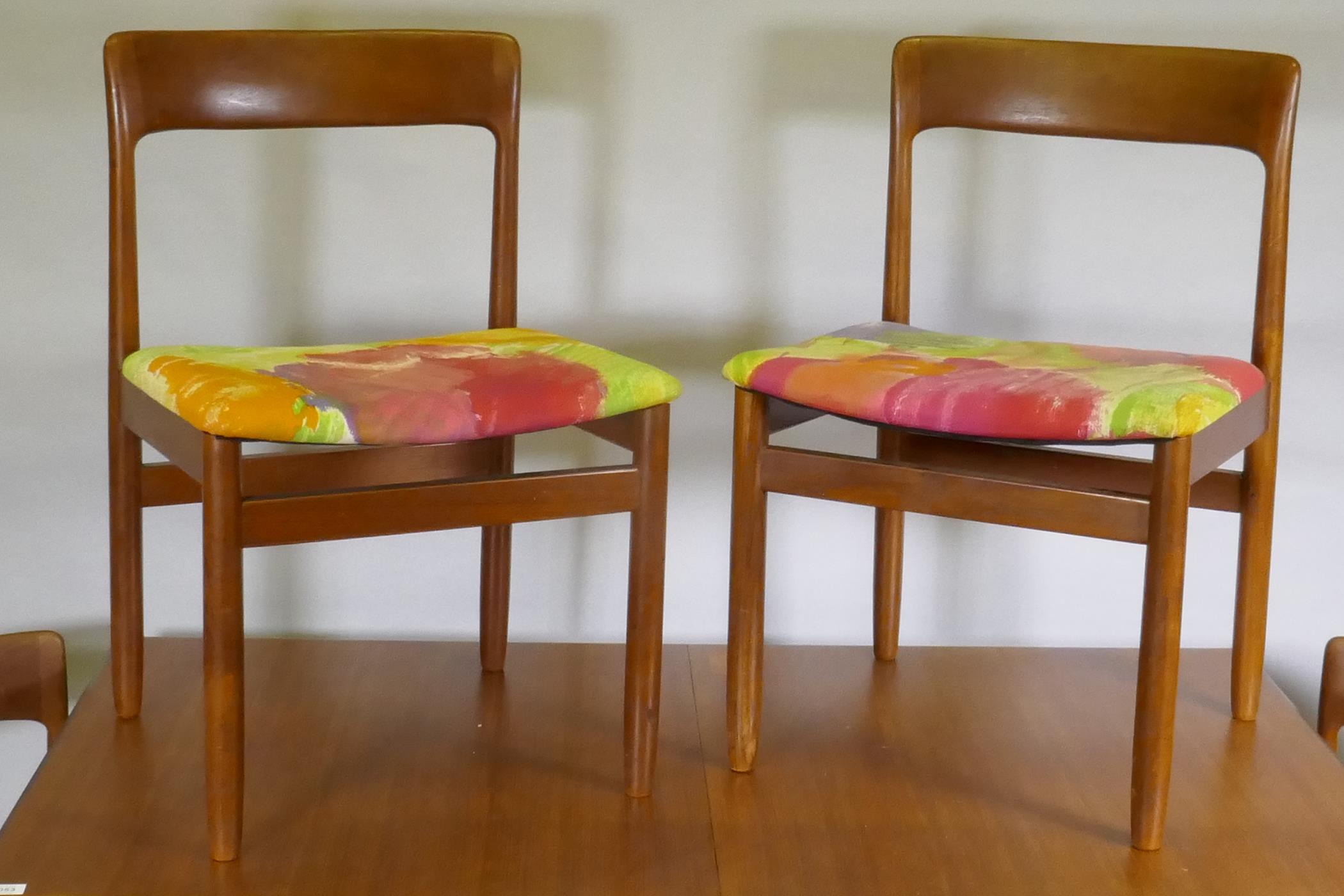 A mid century teak extending dining table, with folding leaf, designed by John Herbert for A. - Image 2 of 5