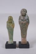 An Egyptian turquoise glazed faience Shabti, mounted on a display base, and another smaller, 17cm