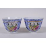 A pair of Chinese blue and white porcelain tea bowls with polychrome enamels panels depicting two