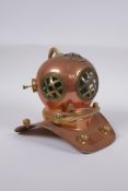 A model copper and brass deep sea diver's helmet, 18cm high