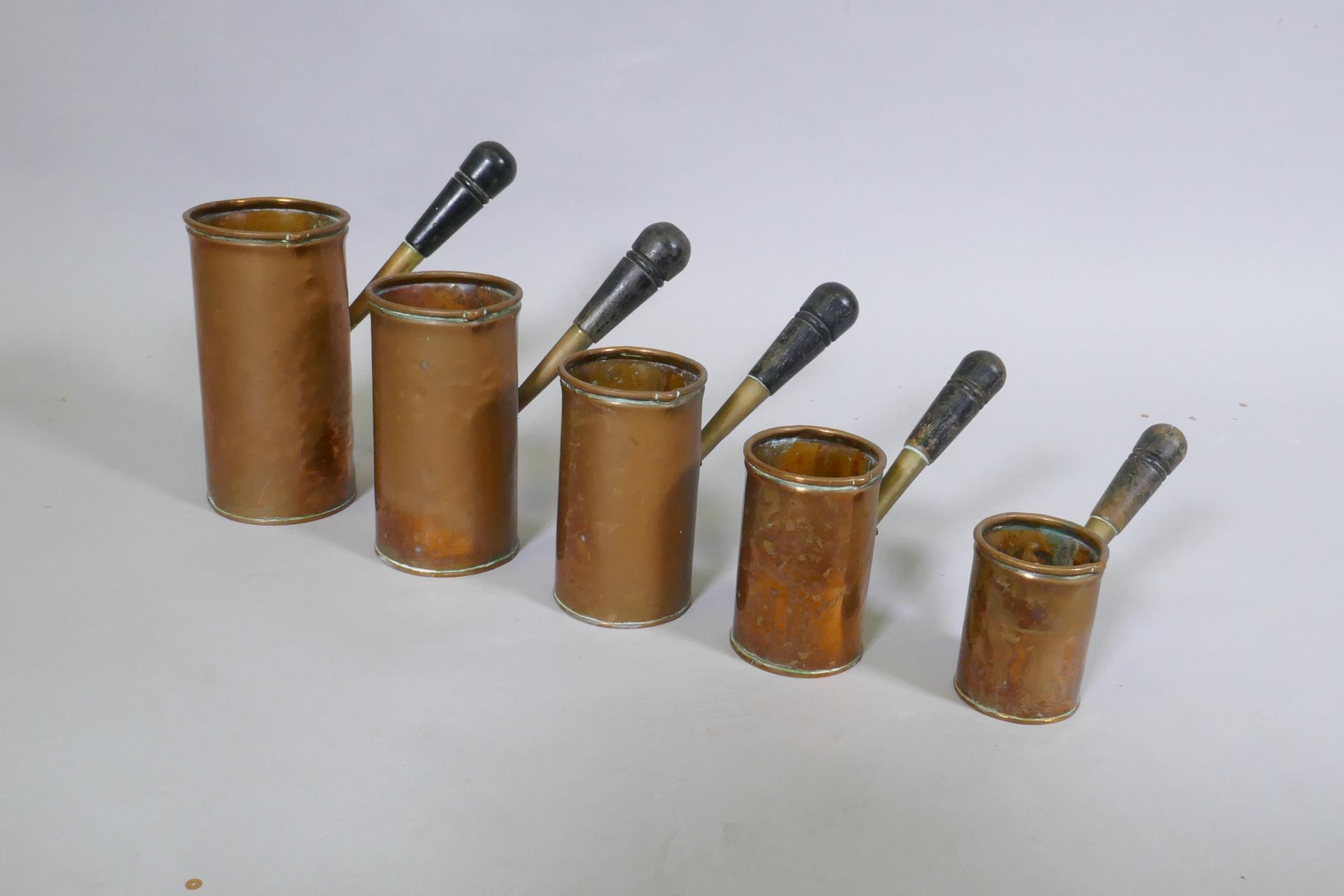 Five graduated copper cooking pots, largest 19cm high - Image 2 of 2