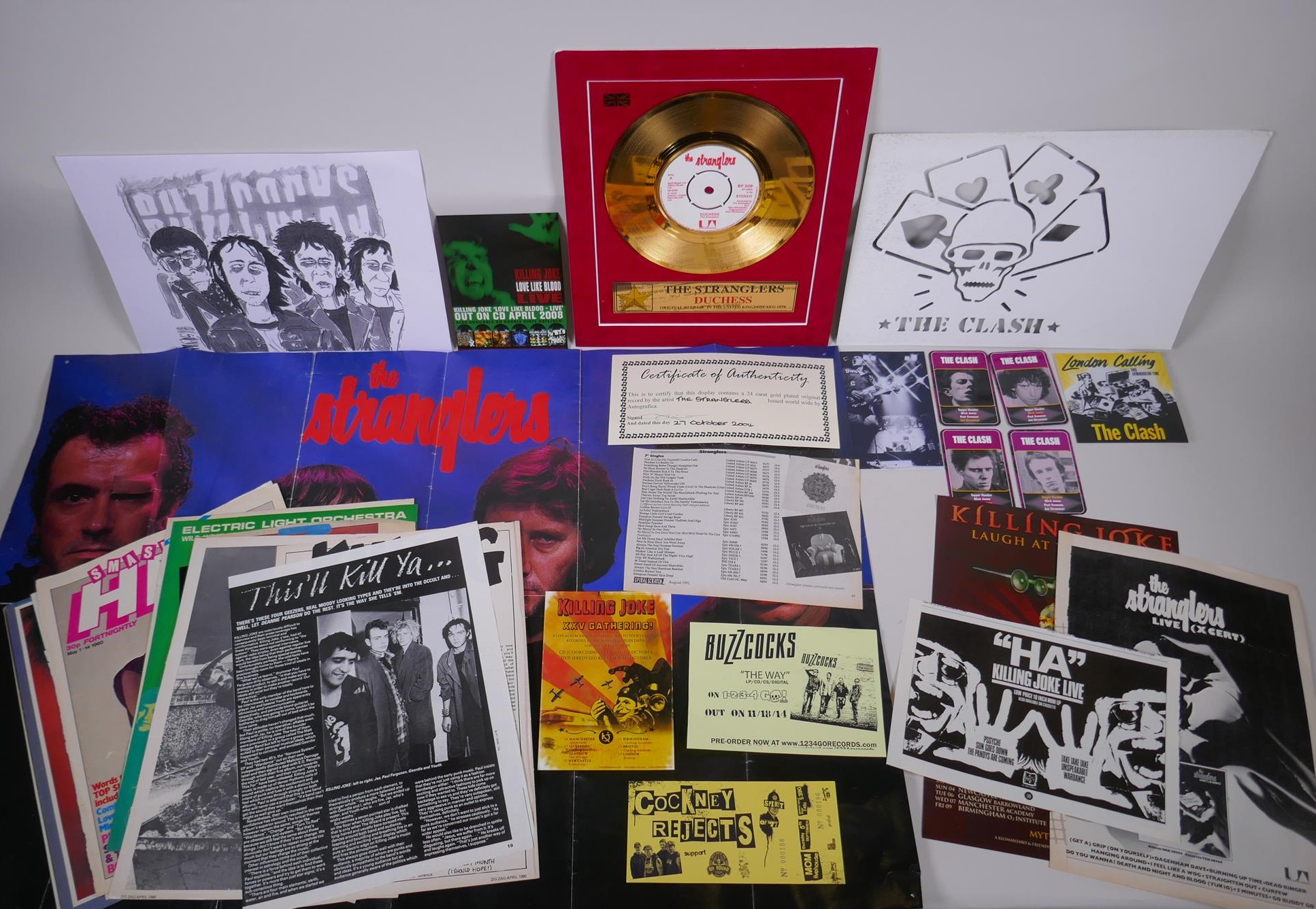 A quantity of punk ephemera, including a Stranglers gold disc for the Duchess, posters, ticket