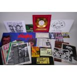 A quantity of punk ephemera, including a Stranglers gold disc for the Duchess, posters, ticket