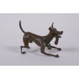 A bronzed metal figure of an enthusiastic dog, modelled after the Disney Pixar dog Dante from the