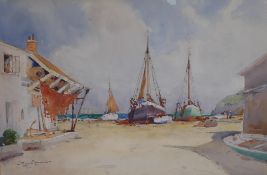 Eyres Simmons, coastal view with fishermen by beached boats, signed, watercolour, 36 x 53cm