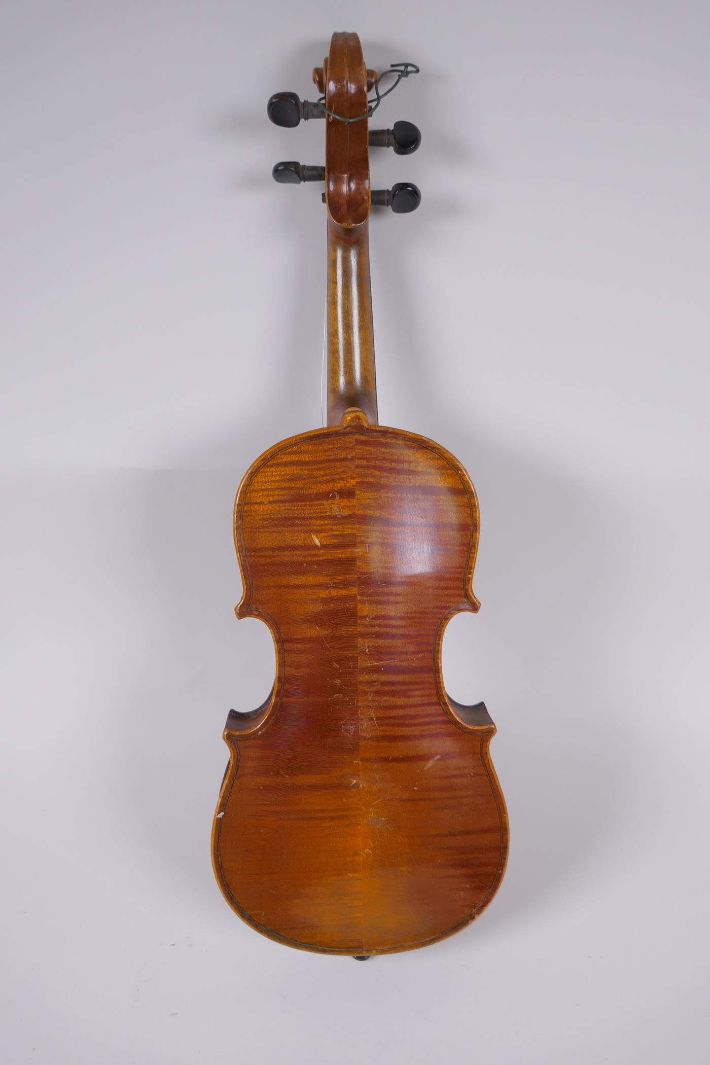 An antique half size violin with a two piece back and ebony finger board, 46cm long - Image 4 of 5