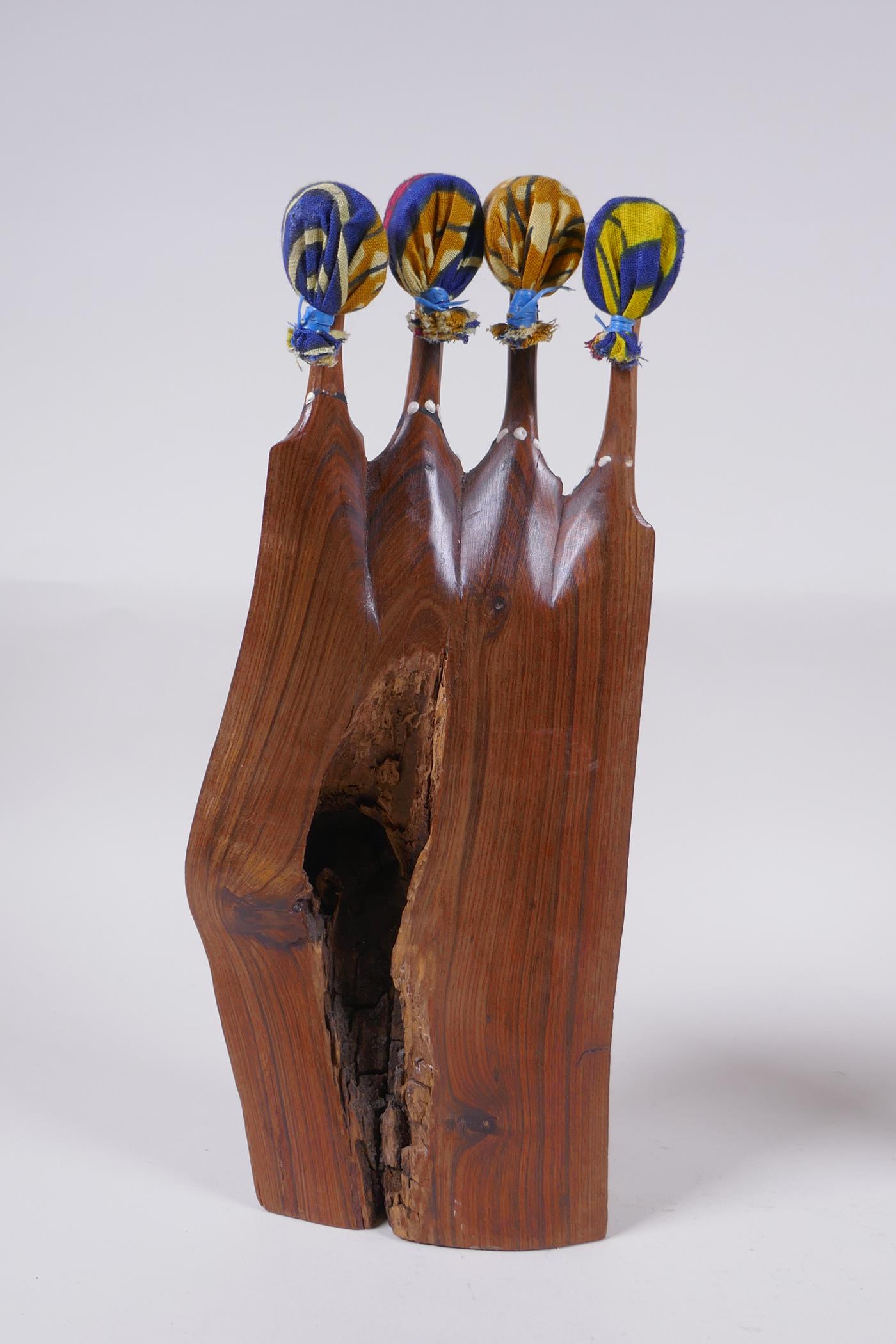 Two African carved hardwood female figure groups with traditional material headdresses, and an - Image 3 of 7