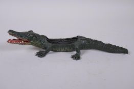 An Austrian style cold painted bronze pin tray in the form of a crocodile, 22cm long