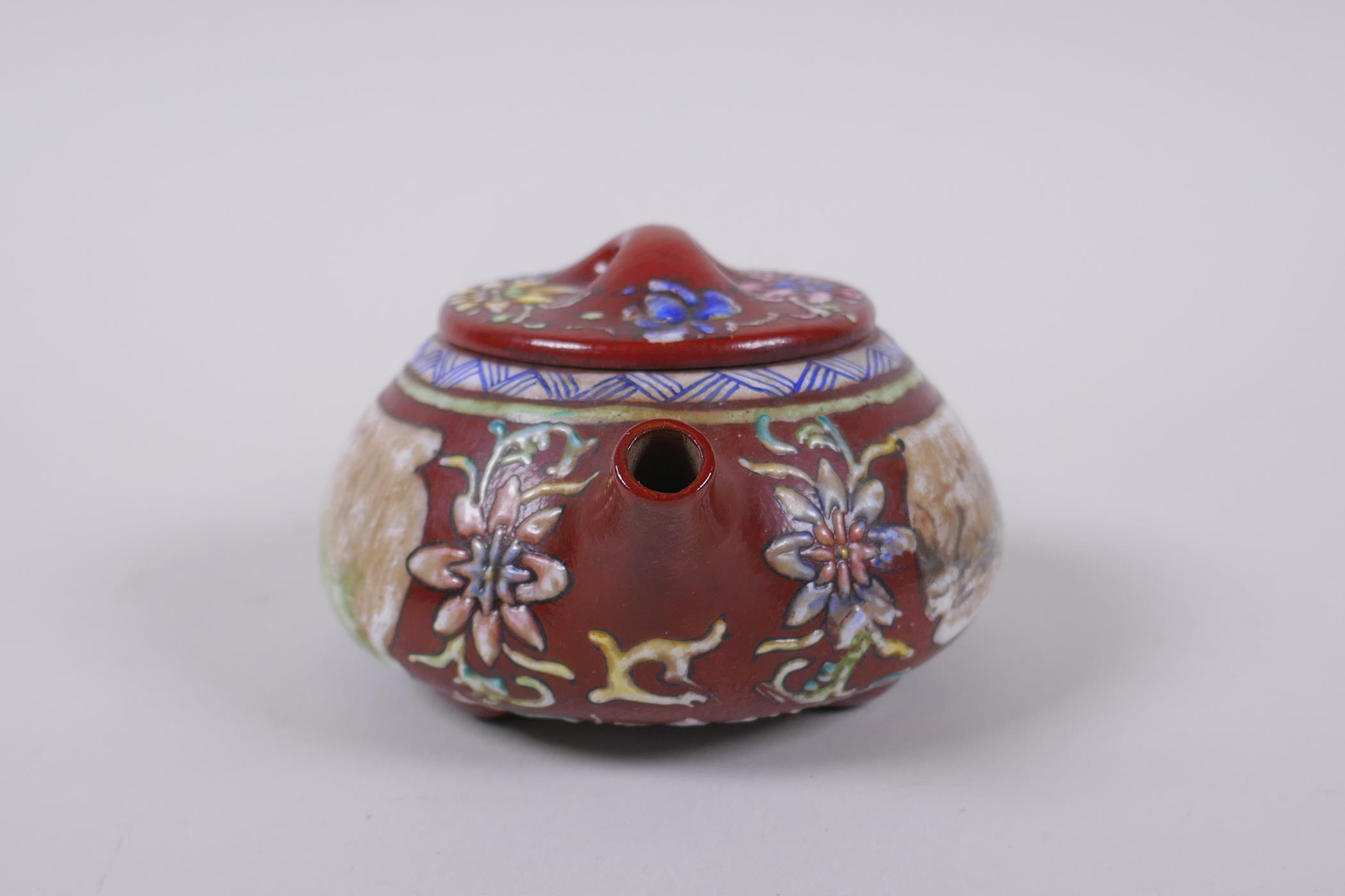 A Chinese YiXing tea pot with enamelled decoration of flowers and a riverside landscape, impressed - Image 2 of 5