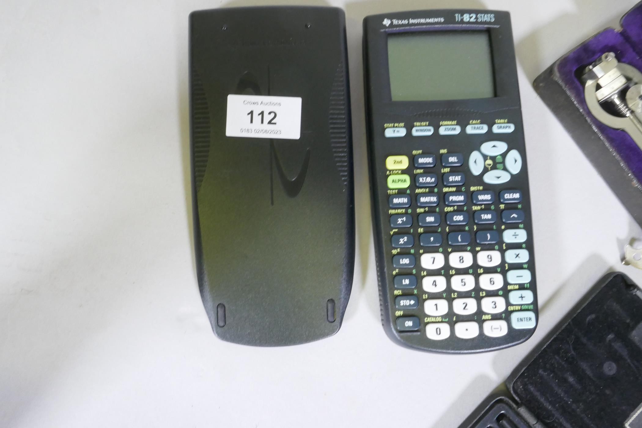 A cased Stanley technical instrument, Heerbrugg Compasses and a Texas Instruments calculator - Image 5 of 5