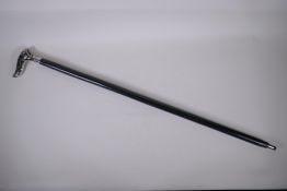 An ebonised wood walking stick with a chromed metal and enamel Art Nouveau style handle, 92cm long