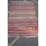 An Afghan multicolour ground kilim rug, 170 x 240cm