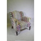 An armchair with Indian embroidered covers