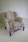 An armchair with Indian embroidered covers