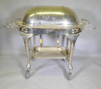 A silver plated meat carving trolley, with roll top cover, 124 x 68 x 104cm