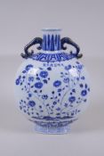 A blue and white porcelain two handled moon flask with floral decoration, Chinese Xuande 6 character