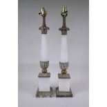 A pair of bronze and alabaster table lamps, 66cm high