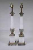 A pair of bronze and alabaster table lamps, 66cm high