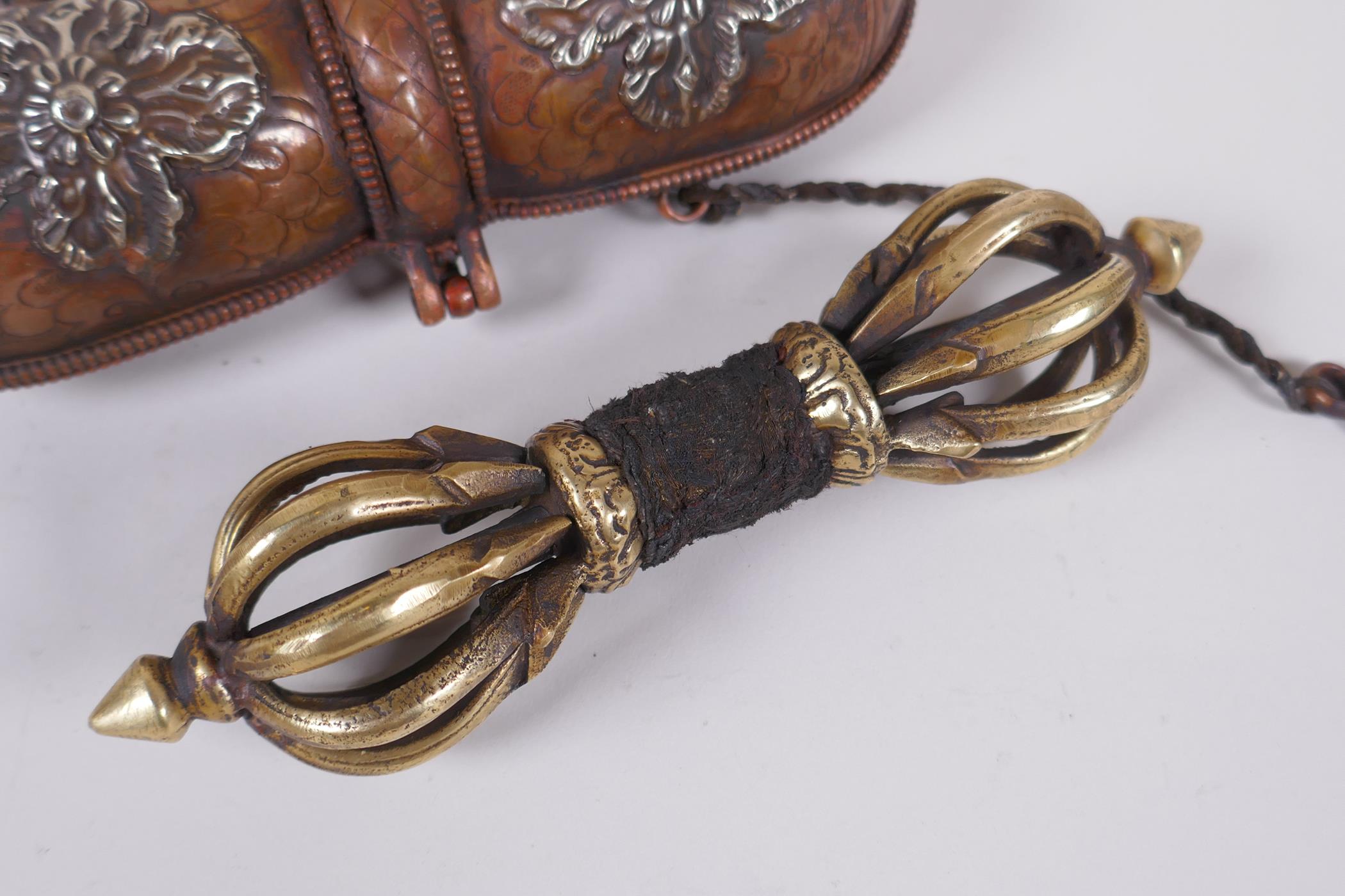 A Tibetan bronze vajra in a repousse copper carry case, 18cm long - Image 2 of 4