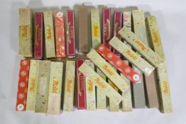 A quantity of Meloto and Play Rite pianola music rolls