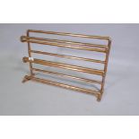 A rack fabricated from copper pipe, 55 x 14 x 36cm