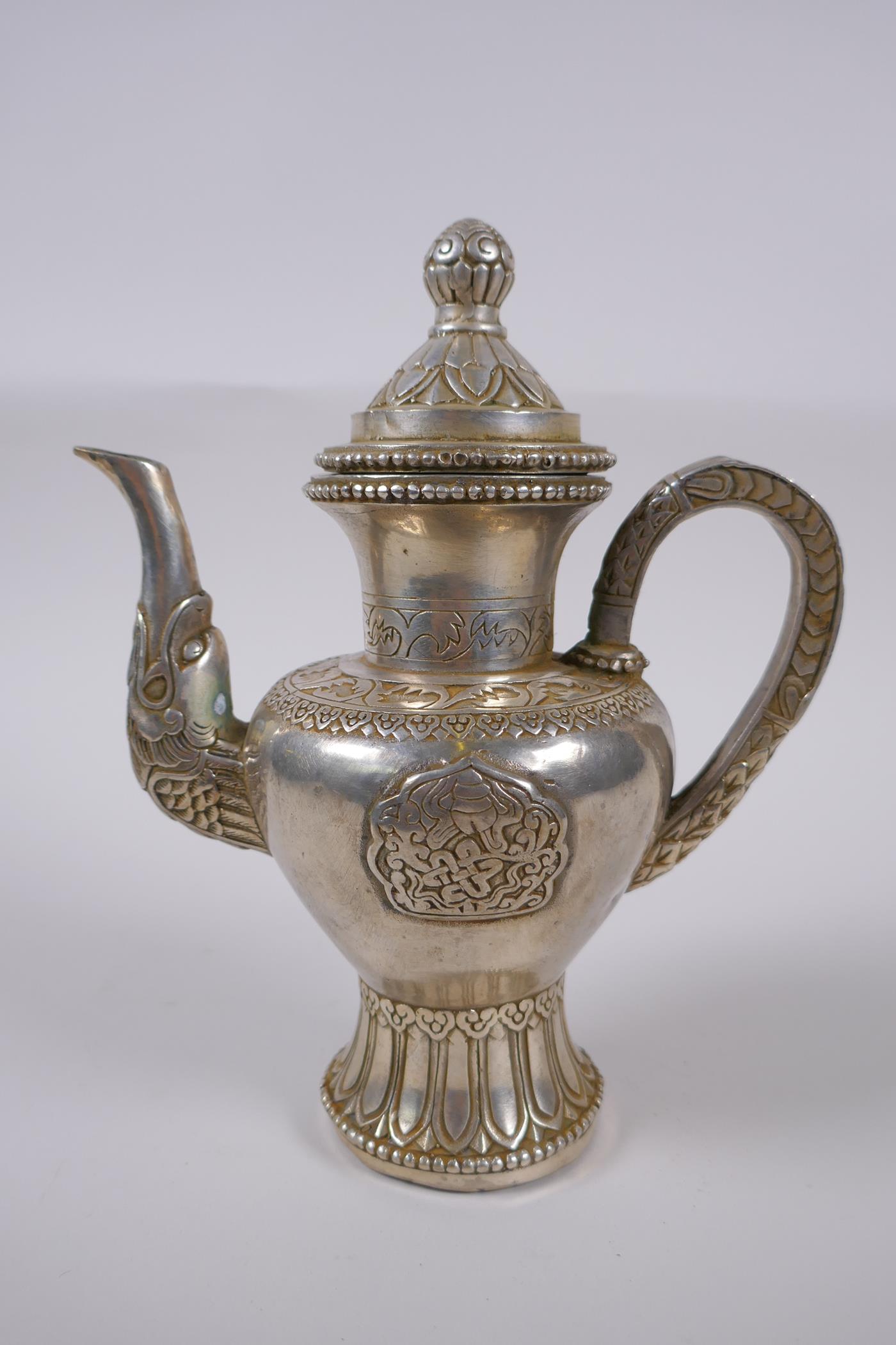 A Tibetan white metal ewer, double vajra mark to base, 20cm high - Image 5 of 6