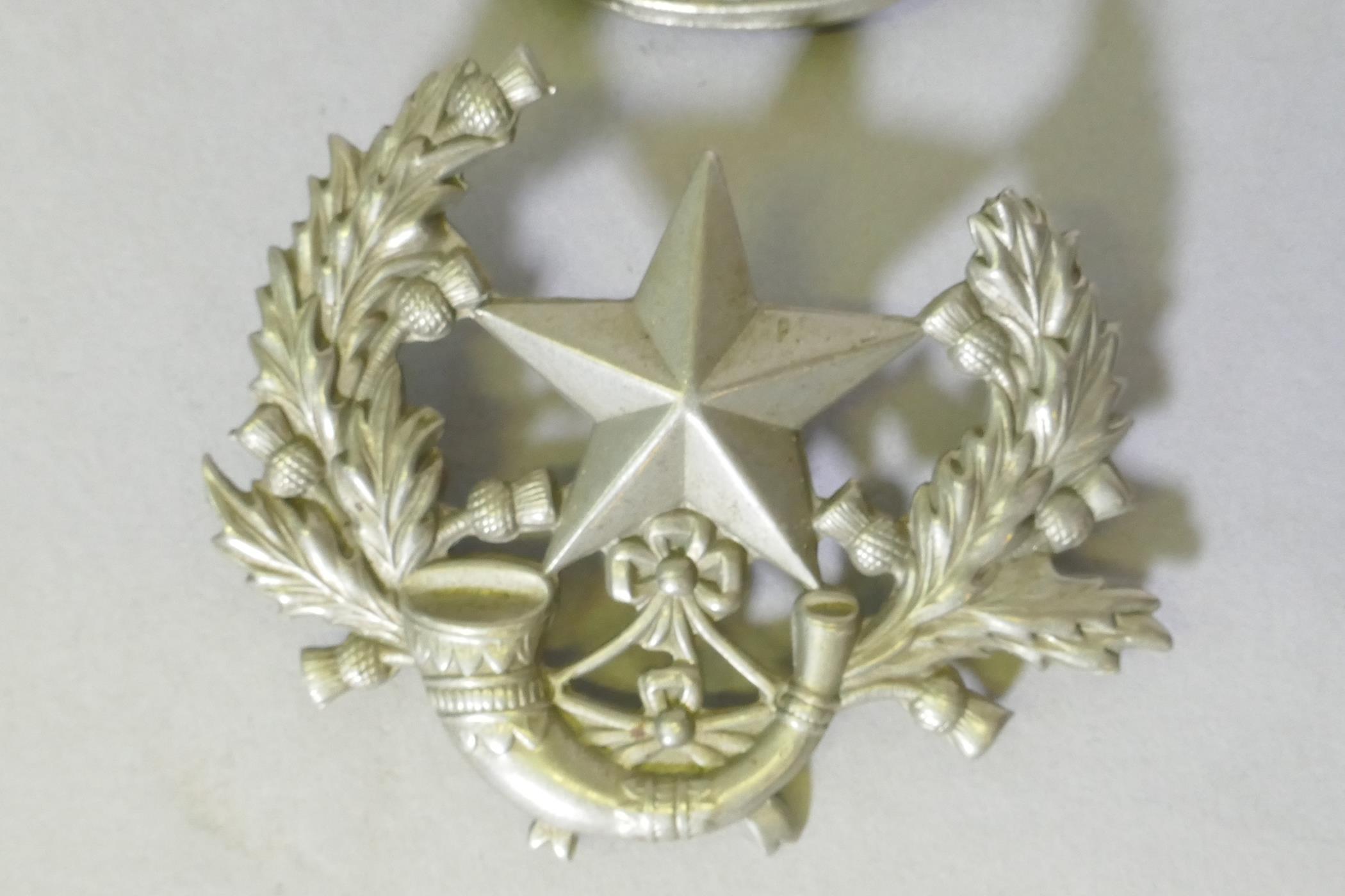 A Lorne Scots, Peel, Dufferin and Halton Regt cap badge, 8cm and a Scottish rifles regimental cap - Image 3 of 3