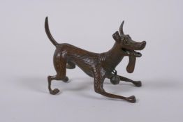 A bronzed metal figure of an enthusiastic dog, modelled after the Disney Pixar dog Dante from the