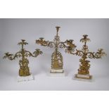 Three antique ormolu and marble three branch candlesticks with figural decoration, AF, largest