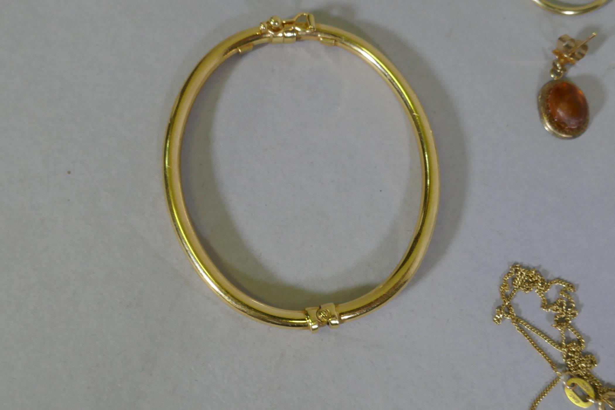 9ct gold, three crucifix, chains and hoop earrings, studs and pendants, 7.7g weighable gold, 9.4g - Image 3 of 4