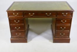 A mahogany pedestal desk, with nine drawers and a leather inset top, 137 x 70cm, 78cm high