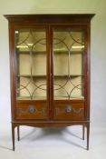 A Victorian mahogany Adam style display cabinet, with fluted frieze and harebell and paterae