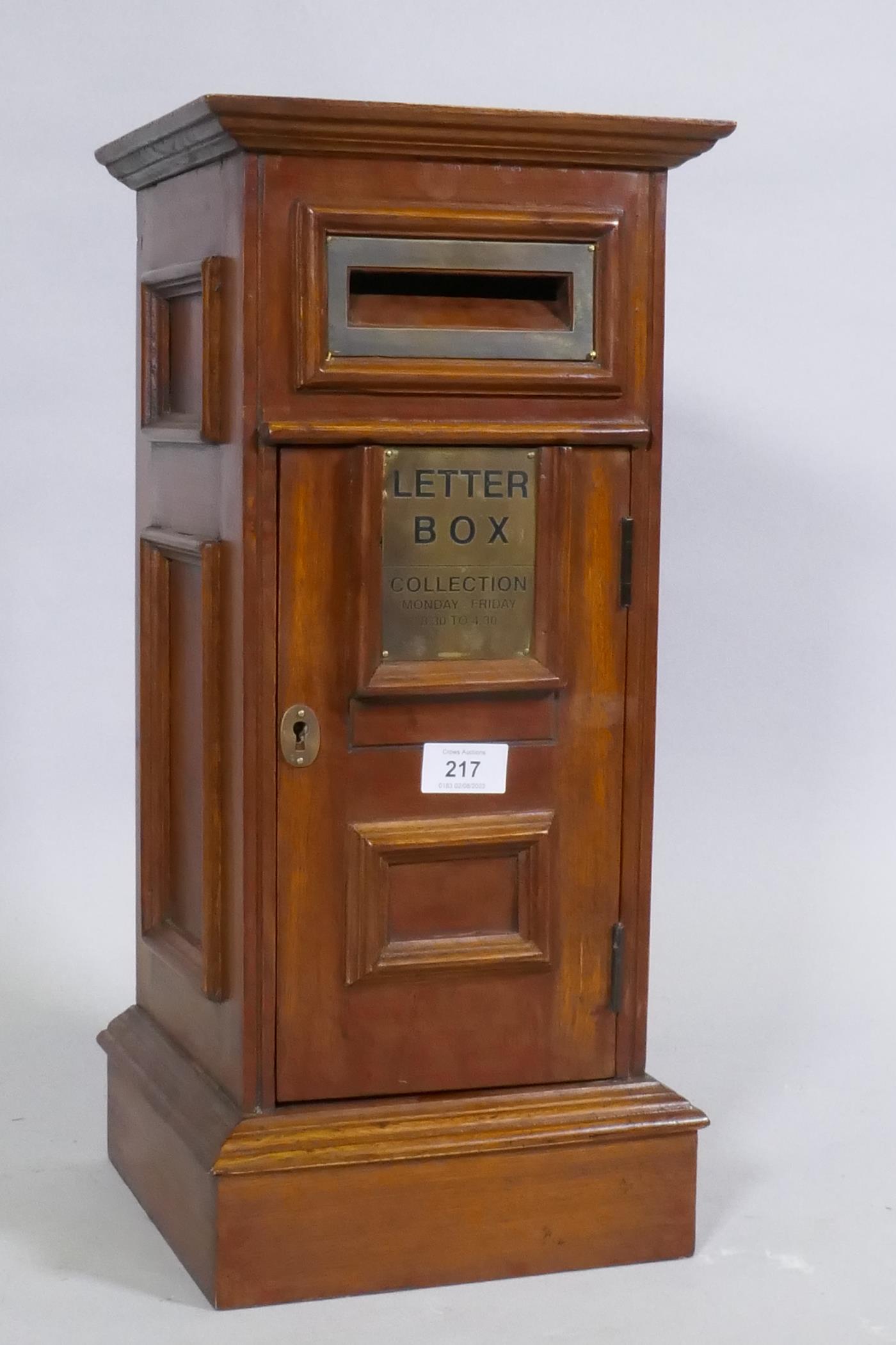 A Victorian style mahogany table letter box, 23 x 23 x 50cm