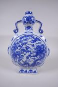 A Chinese blue and white porcelain two handled moon flask of hexagonal form, decorated with a dragon