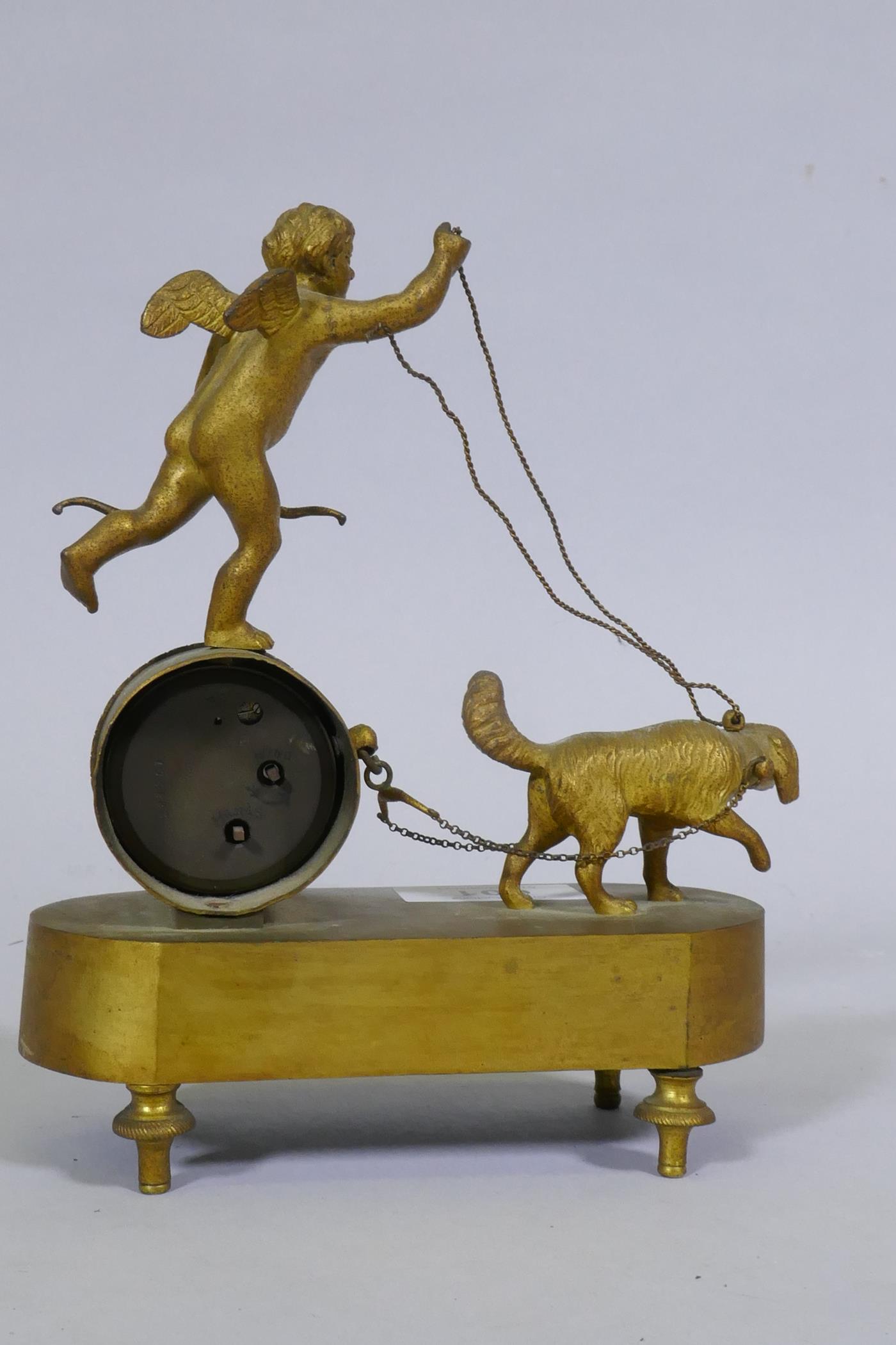 A C19th French Empire Style ormolu mantel clock, with putto and dog, and anthemion decoration, - Image 2 of 5