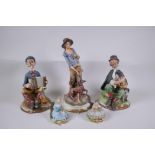 Three Capodimonte porcelain figures including a pair of ring holders in the form of seated flower
