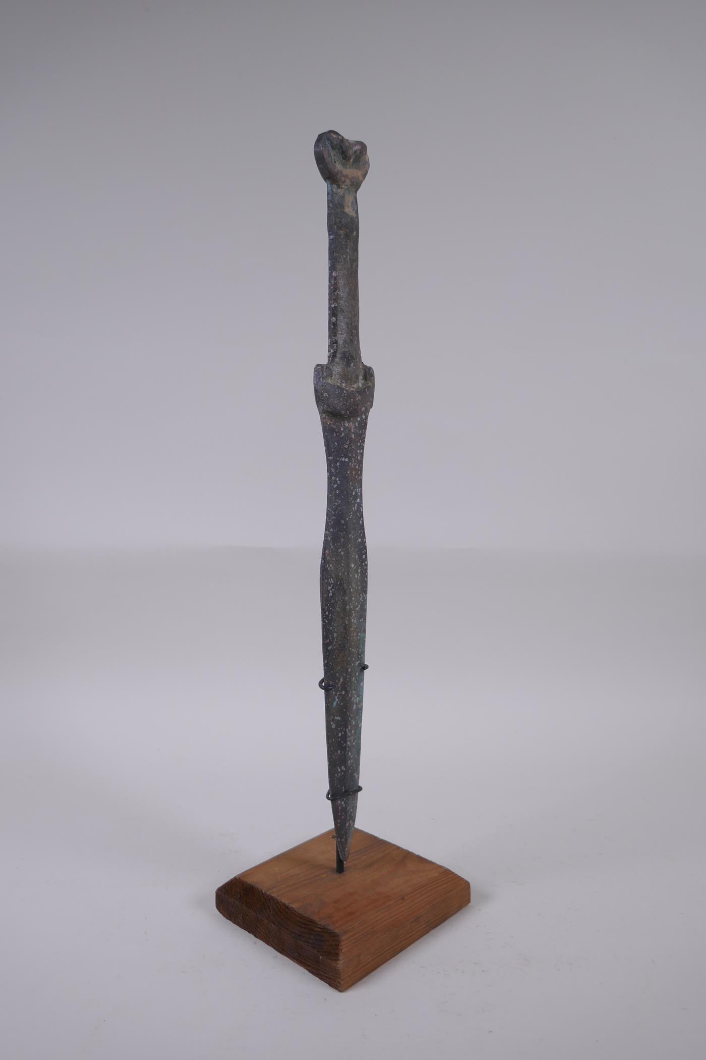 A Chinese archaic style bronze dagger on a display stand, 40cm high - Image 2 of 2