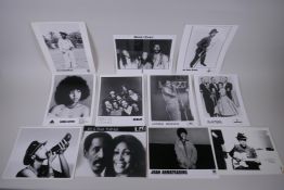 A quantity of black and white press and promotional photographs of musicians including WAR, James