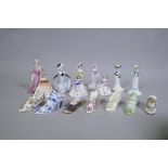 A collection of nine Coalport small and miniature porcelain figures of ladies and seven porcelain