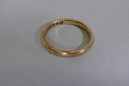 A 9ct gold wedding band, 2.37g