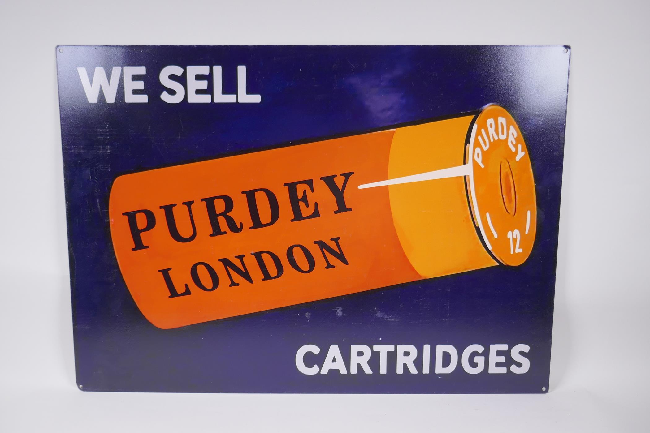 A vintage style metal Purdey Cartridges advertising sign, 70 x 50cm