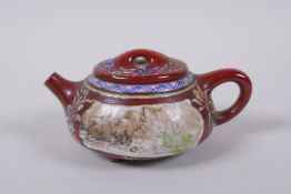 A Chinese YiXing tea pot with enamelled decoration of flowers and a riverside landscape, impressed