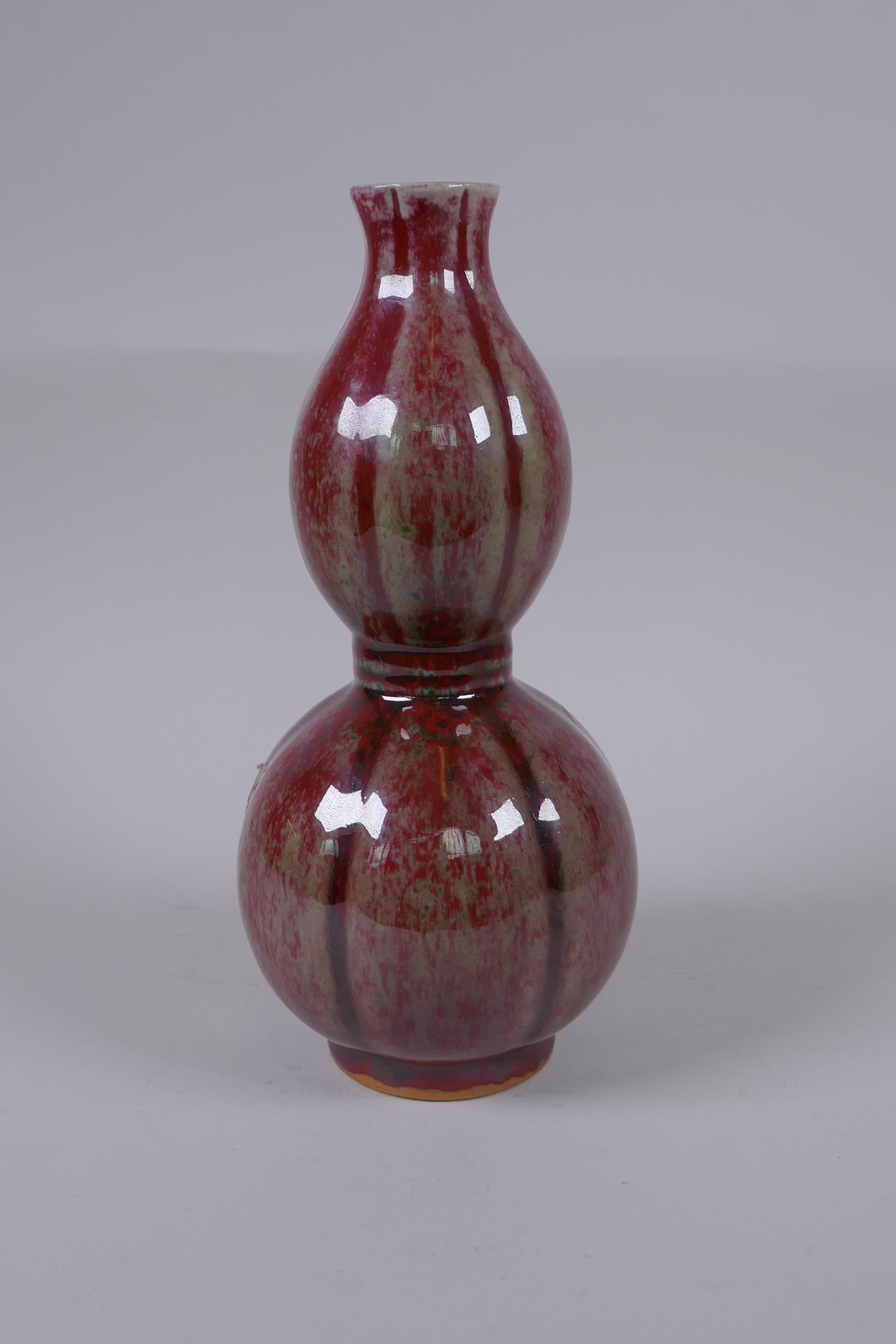 A Chinese flambe glazed double gourd porcelain vase, 25cm high - Image 3 of 4