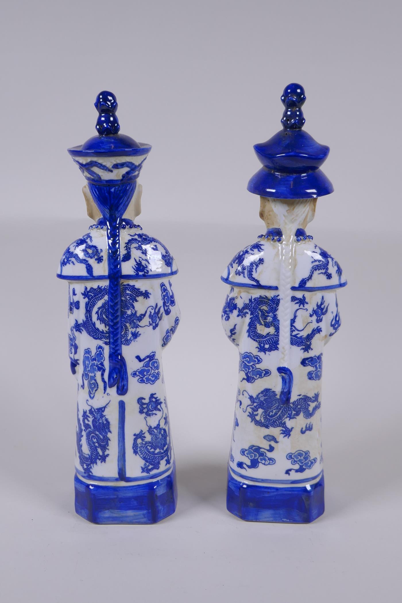 A pair of Chinese Qing Dynasty blue and white porcelain figures, impressed marks to base, 29cm high - Image 3 of 6