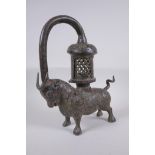 A Sino Tibetan bronze lantern in the form of a bull, 37cm high